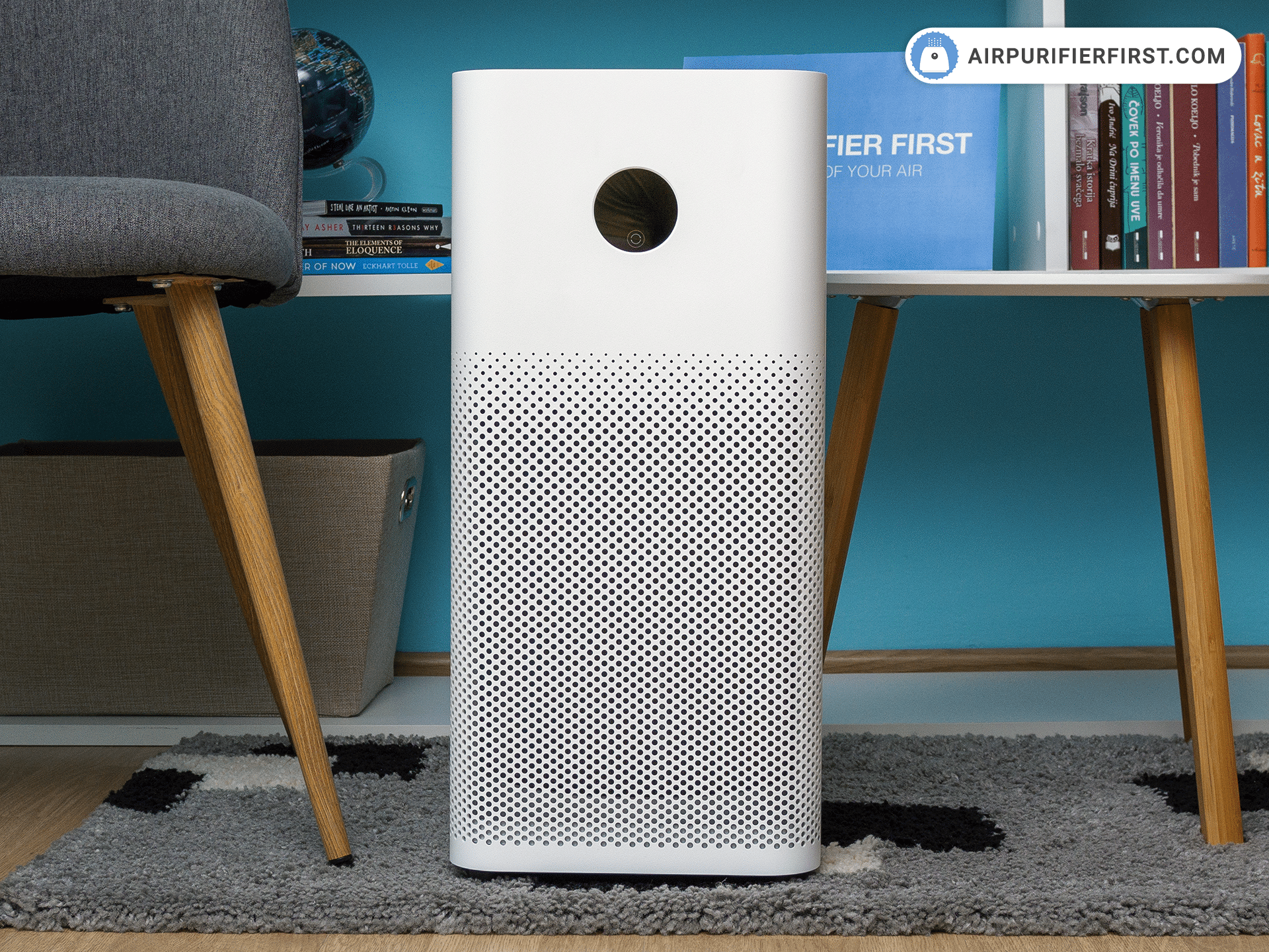  The image shows two Xiaomi Air Purifier 3 and 2S air purifiers in a living room.